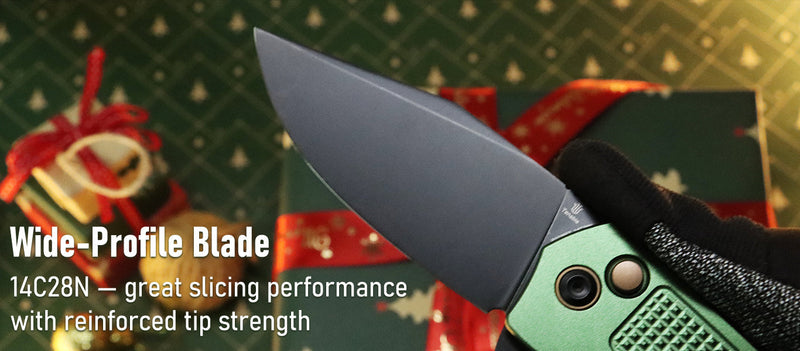 Folding knife with wide-profile blade on a decorative background